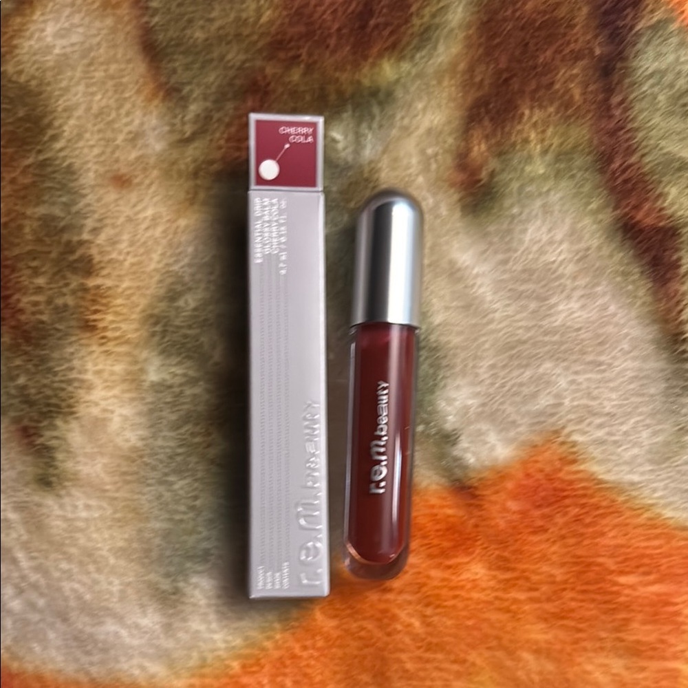 r.e.m. Beauty Essential Drip Glossy Balm in Cherry Cola